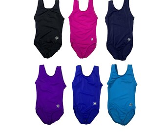 May include: Six solid-colored leotards in black, fuchsia, navy, purple, blue, and teal. Each leotard has a scoop neck and a small snowflake design. The leotards are likely for gymnastics or dance.