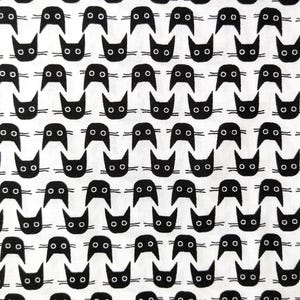 May include: A repeating pattern of black cat faces on a white background. The cats have round eyes and whiskers. This design is suitable for fabric, wallpaper, or other decorative applications.