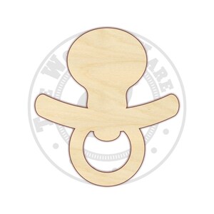 May include: Wooden cutout of a baby pacifier, a popular craft supply for baby shower decorations and gifts.