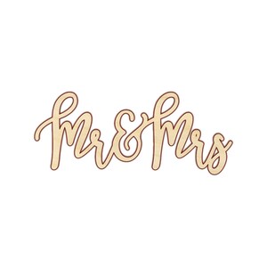 May include: Wooden sign with the words "Mr & Mrs" in a cursive font.