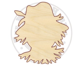 May include: A wooden cutout of a scarecrow with a hat and long, flowing hair. The cutout is unpainted and ready to be decorated.