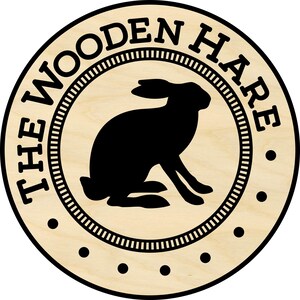 a wooden sign with a dog on it