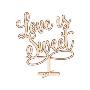 May include: Wooden cutout of the phrase "Love is Sweet" with a decorative swirl design. The cutout is mounted on a wooden stand.