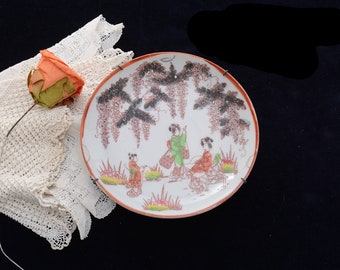 Japanese Porcelain Plate with Scene of Three Women.