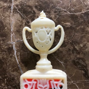 Trophy-Shaped Pencil Sharpener Scrolling White with Red Sharpener circa 1960 Vintage Miniature Collectible B8