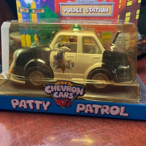 1997 Chevron Cars Patty Patrol Toy Car with Original Police Station Box