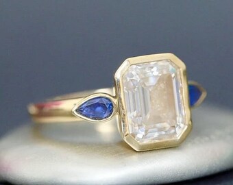 Bespoke Cremation Jewelry • The “Alicia” Ring • Emerald Cut Moissanite With Pear Side Stones Cremation Ring for Ashes