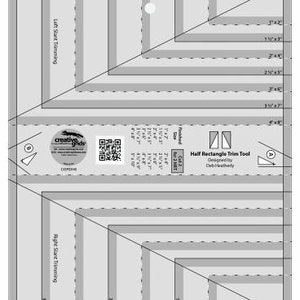 May include: A clear, rectangular quilting tool with grey and white markings and measurements. The tool features diagonal lines, angles, and the text "Half Rectangle Trim Tool". The Creative Grids logo is visible.