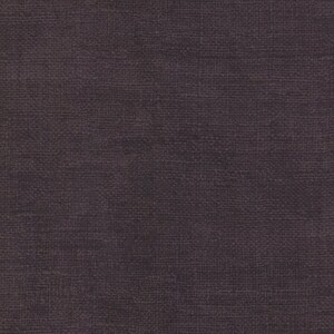 May include: A close-up of a dark brown textured fabric with a subtle woven pattern.