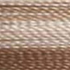 May include: Close-up of a woven fabric with a textured surface. The fabric has a gradient of brown and beige colors.