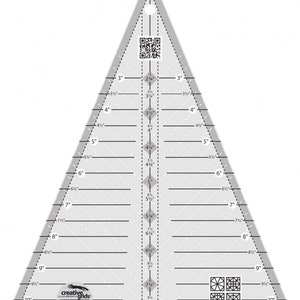 May include: A clear plastic triangle ruler with black markings for quilting and sewing. The ruler is 10 inches long and has markings for half inches, quarter inches, and eighth inches. The ruler also has a spider web design and the text "Spider Web" and "Designed by Karla Alexander".