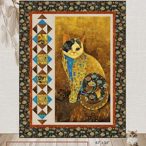 May include: A quilt panel with a Klimt-inspired cat design in gold, blue, and black. The quilt measures 107 x 137 cm and is designed for 61 cm panels. The words "Family Album" are at the top. The Sweet Tea Girls Patterns.