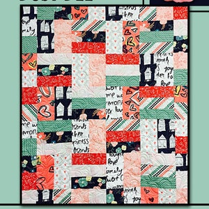 May include: A quilt pattern called "Busy Bee" with a patchwork design featuring various colors and patterns, including red, pink, green, and black. The quilt is made up of squares with different words and phrases on them, such as "love", "friends", and "family". The quilt is surrounded by a border with a floral design.