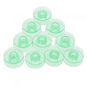 10 pre-owned HusqvarnaViking bobbins (green) 5/6/7 machines
