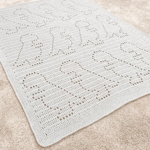 Lexi ブランケット | フィレ クロッシェ ブランケット パターン | ベビー ブランケット クロッシェ パターン | フィレ ブランケット | フィレ クロッシェ パターン | 恐竜 | T-Rex
