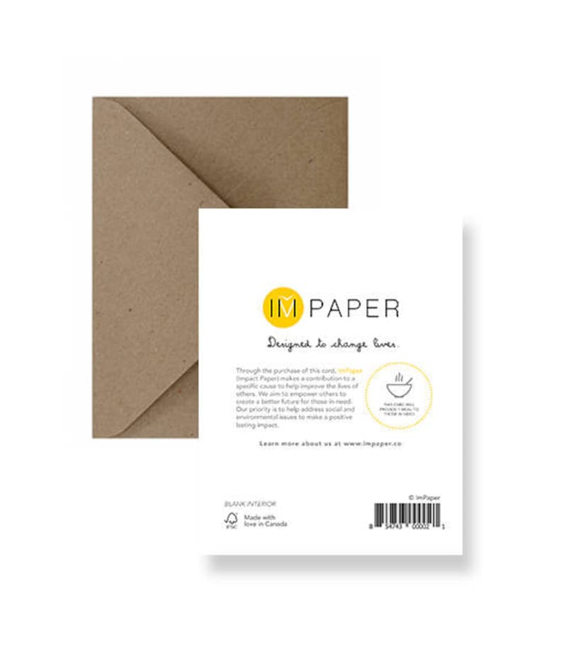 May include: A brown envelope with a white card inside. The card has a yellow logo with the text "IM PAPER" and the text "Designed to change lives." The card also has a small illustration of a bowl of soup.