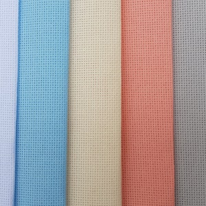 May include: A close-up of seven fabric swatches in different colors. The swatches are arranged horizontally from left to right: white, light blue, cream, peach, light gray, black.