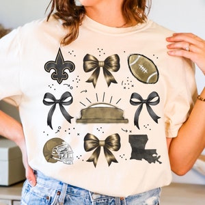 ニューオーリンズセインツフットボールシャツコケットルイジアナフットボールチームファンアパレルゲームデーTシャツフットボールギフトノラスーパードームティーフットボール