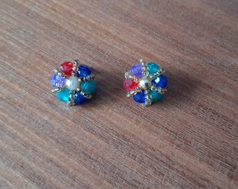 Stylish retro earrings clip on design made with multicoloured beads in red, purple, green, blue, yellow & gold, circular flower like pattern