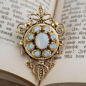 Cabochon Opal Oval Center and Opal Halo Pendant and Vintage Pin