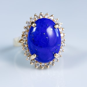 Vintage Lapis Lazuli Ring in 14k Yellow Gold with Diamond Halo