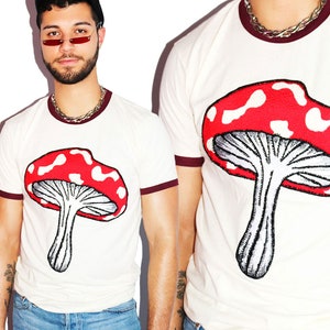 Eat Me Mushroom Ringer Tee - Bugandy