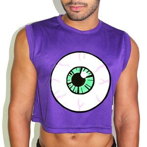 May include: Purple sleeveless crop top with a white eye graphic with a green iris and black pupil.