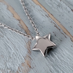 Tiny Silver Star Cremation Ash Urn Pendant Necklace in Silver Stainless Steel for Pet Remains a Memorial Keepsake Engraved Memory Gift