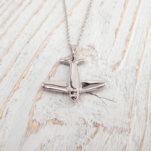 Engraved Airplane Cremation Necklace: Stainless Steel  Pet Memorial Ash Urn Pendant