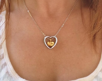 Collana commemorativa a forma di cuore in acciaio inossidabile: ciondolo a urna per ceneri di animali domestici.