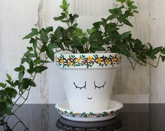 La Jardinera Gaia - Jardinera de Terracota Blanca con Cara
