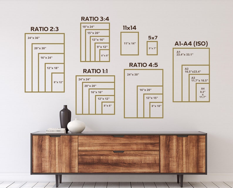 May include: A chart showing different aspect ratios for framing artwork, including 2:3, 3:4, 1:1, and 4:5. The chart also includes standard paper sizes, such as A1, A2, A3, and A4. The chart is displayed on a white wall above a wooden dresser.
