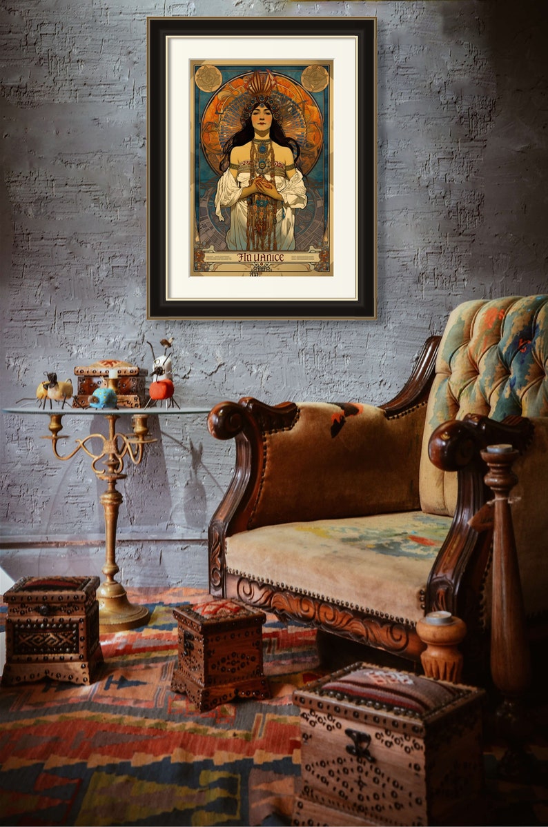 May include: A framed vintage poster with a woman in a flowing white dress and a crown of flowers. The poster is titled "La Villance" and is surrounded by a gold frame.