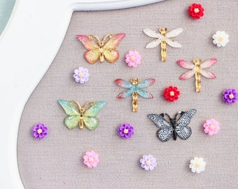 Punaises papillon, libellule et fleur scintillantes : épingles nature