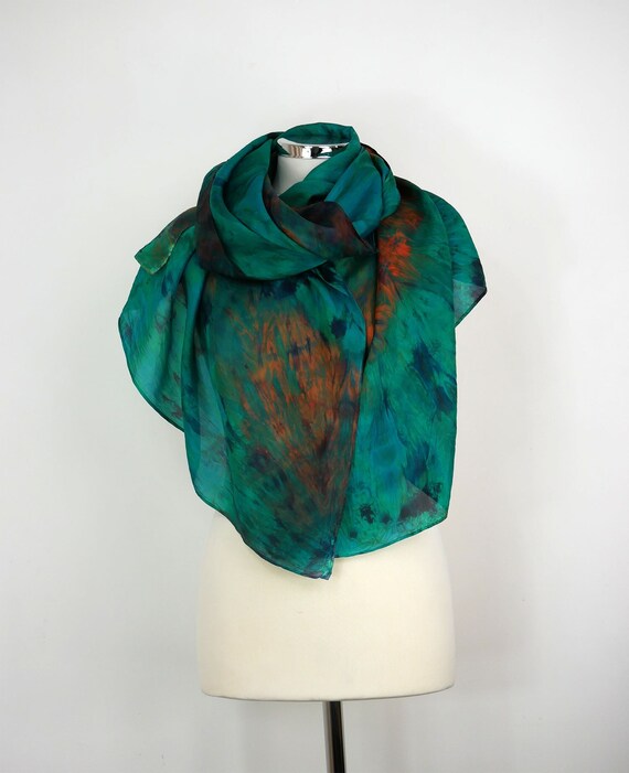 Silk scarf in emerald green with motifs