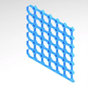 May include: A blue, geometric structure with a honeycomb pattern. The design features numerous hexagonal cells connected in a grid-like arrangement. The object is made of a solid, opaque material and is set against a plain white background.