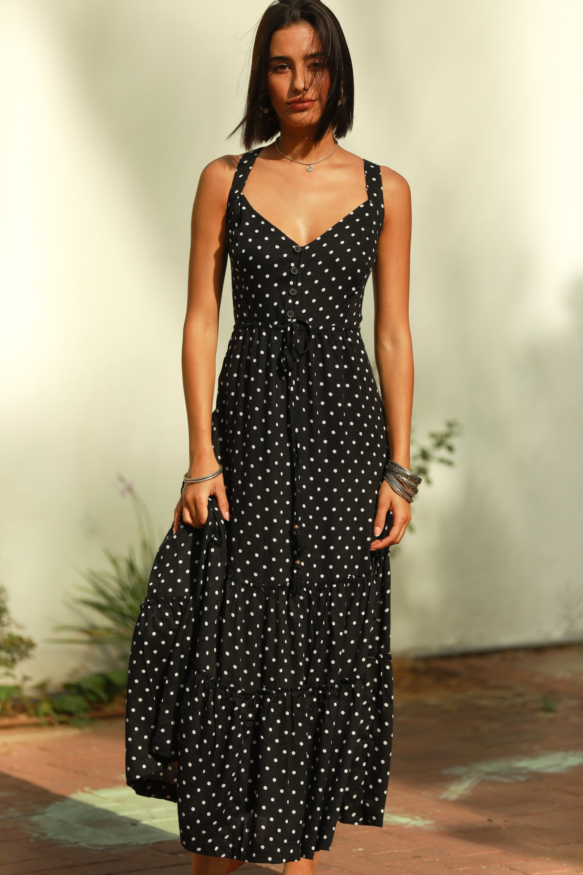 black dress with white polka dots Strapless Ruffled Polka-Dot Long Prom Slit Black/White / 0 is wearing an XS AS SEEN ON Tiffany Polka Dots Dress