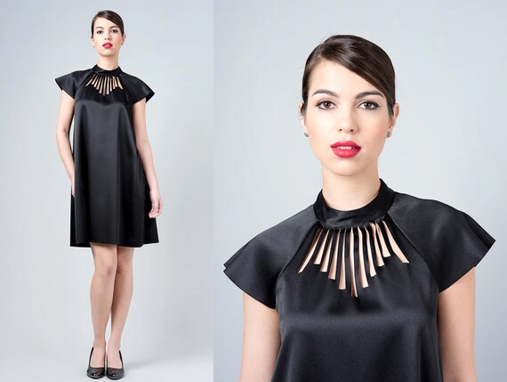 white christmas dresses Vince Camuto Black Laser-Cut Fit and Flare Cocktail Dress – SilkRoll main image 0