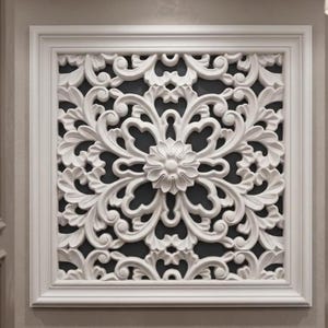 May include: A square, white, ornate wall panel with a floral design. The panel features a central flower and swirling, leaf-like patterns. The design is framed by a white border, creating a decorative element for interior spaces.