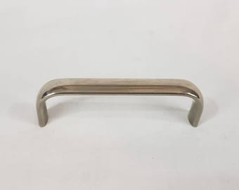 Vintage chrome drawer pull.