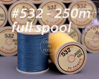 May include: Two spools of thread, one blue and one yellow, labeled with the number 532 and the text "Craft N Tools". The spools are 250 meters long.