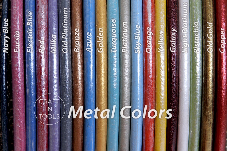 May include: A close-up view of 16 different metallic paint colors, including navy blue, fuchsia, electric blue, red, milka, old platinum, bronze, azure, golden, turquoise, platinum, sky blue, orange, yellow, galaxy, light platinum, pistachio, old gold, and copper. The colors are displayed on small, round, wooden dowels. The text "CRAFT N TOOLS Metal Colors" is visible at the bottom of the image.