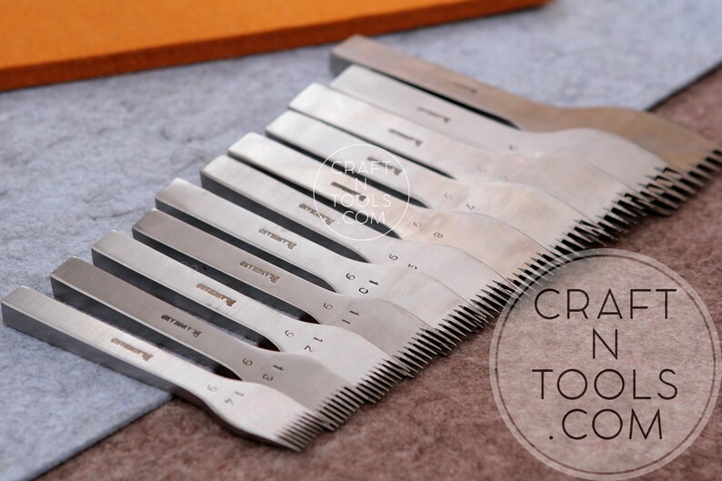 May include: A set of 10 silver leather stitching tools with a serrated edge. The tools are arranged in a row, with the smallest tool on the left and the largest tool on the right. The tools are labeled with numbers from 1 to 10. The tools are on a gray surface. The text "CRAFT N TOOLS .COM" is visible in the lower right corner of the image.