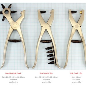 May include: Three silver hole punches with different tip configurations. The first punch has a revolving tip with six different sizes. The second punch has six fixed tips. The third punch has one fixed tip. The punches are on a grid background with measurements in millimetres.