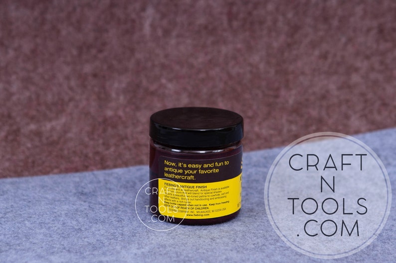 May include: A small jar of leather antique finish. The jar is yellow with black lettering and a black lid. The text on the jar reads "Now it's easy and fun to antique your favorite leathercraft.  FRENGSANTIQUE FINISH".