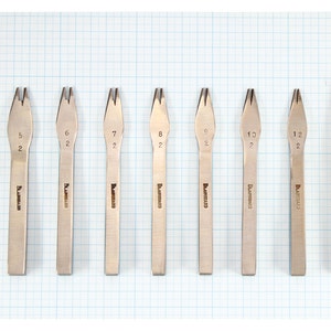 May include: Eight metal tools with different sized prongs, labeled with numbers 5, 6, 7, 8, 9, 10, 11, and 12. The tools are arranged in a row on a gridded surface. A square with the text "10mm" is in the upper right corner of the image.