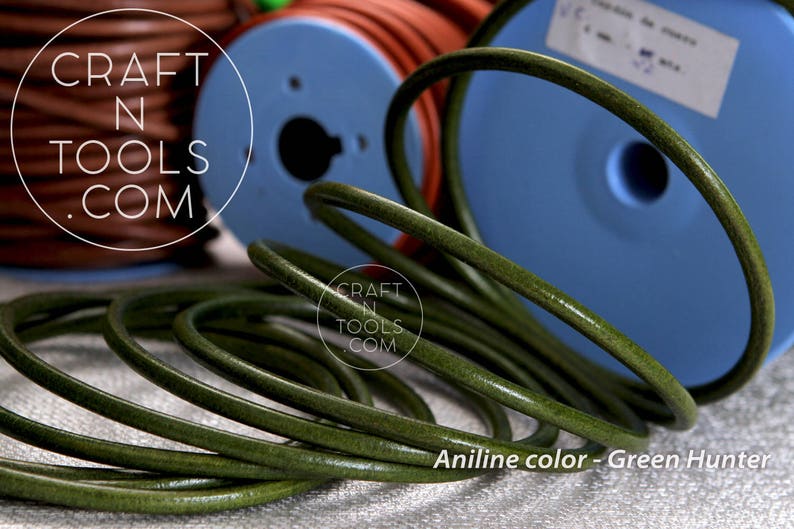 May include: Close-up of a spool of green leather cord. The cord is coiled and has a smooth, polished finish. The text "Aniline color - Green Hunter" is visible at the bottom of the image.