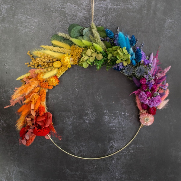 Dried Flower Wreath.  Somewhere Over The Rainbow. A metallic hoop, hand decorated with dried flowers in rainbow shades