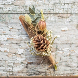 Dried Flower Buttonholes with Pine Cones. Christmas Winter Wedding Flowers. Dried Wedding Flowers for Groom and Bride. Dried Flower Bouquet