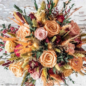 Dried Flower Wedding Bouquet. Bridal Wedding Flowers Including Preserved Peach Roses. Buttonholes to Match. Brides Dried Flower Bouquet